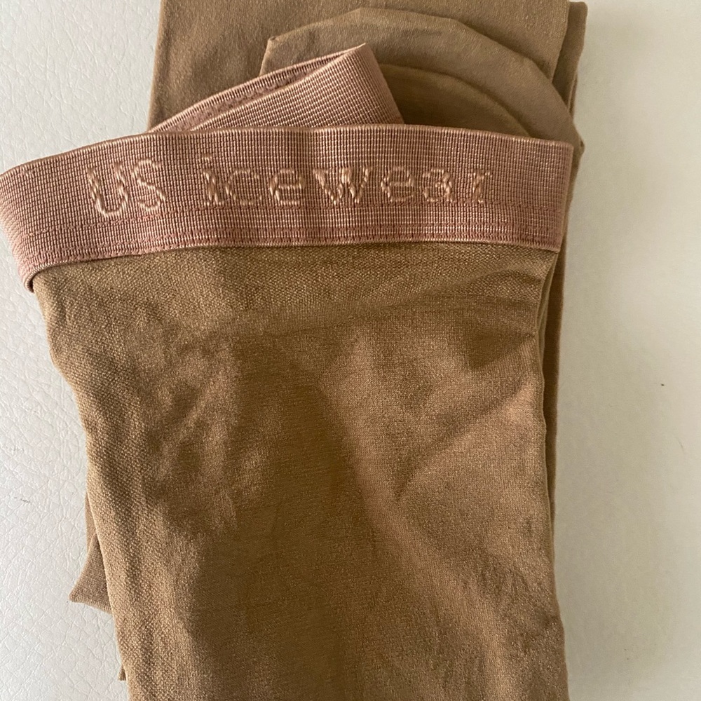 US Ice Wear tights. Tan. 8/10 kids